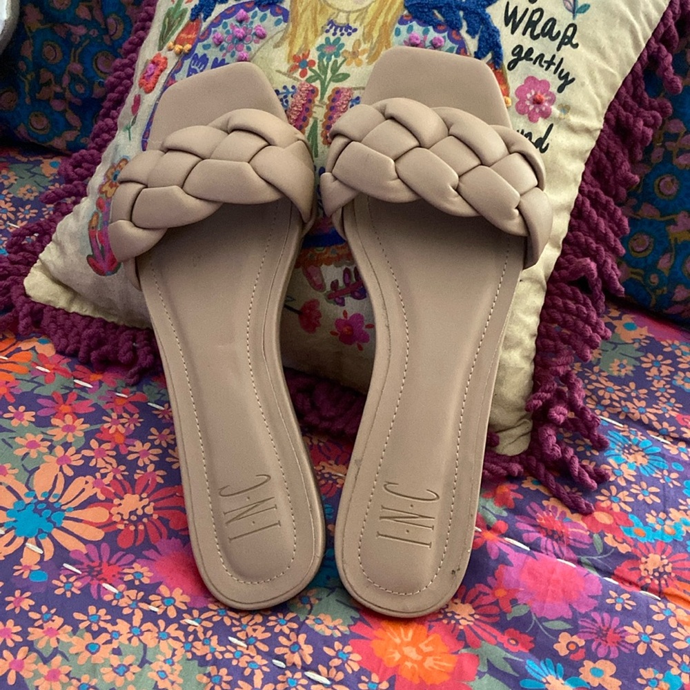 INC sandals. Not too much wear. Definitely no tear. Size 9